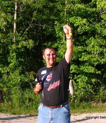 Andy's friend Kenny caught a big fish at Hidden Lake!